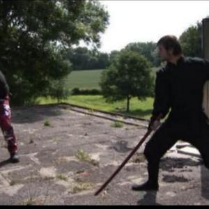 Angus Young (Kevin Evans) against Warren Bishop (Vincent Jerome) in biblical battle
