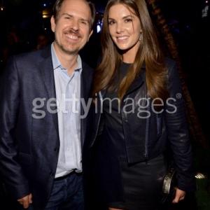 HOLLYWOOD, CA - FEBRUARY 11: Director Josh Stolberg (L) and actress Nikki Moore attend the 'The Hungover Games' cast party at Lure on February 11, 2014 in Hollywood, California. (Photo by Michael Buckner/Getty Images for Sony Pictures Home Entertainment)