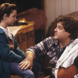 Still of John Goodman and Sara Gilbert in Roseanne 1988