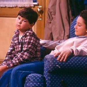 Still of Sara Gilbert and Michael Fishman in Roseanne 1988