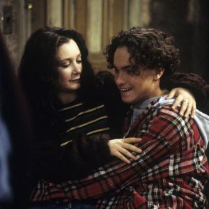 Still of Sara Gilbert and Johnny Galecki in Roseanne 1988