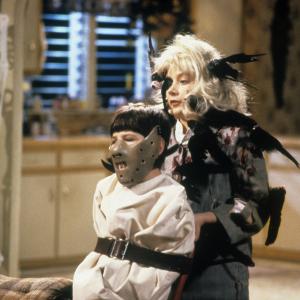 Still of Sara Gilbert and Michael Fishman in Roseanne (1988)