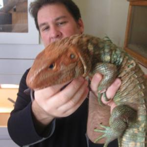 Erik Shein with his caiman lizard Lilly