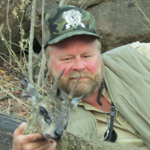 Buck with a Klipspringer in Zimbabwe Africa