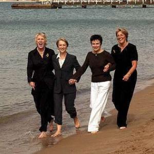 Two of the original calendar girls  Tricia Stewart left and Angela Baker right take a walk with the stars who portray the characters based on their lives Helen Mirren center left and Julie Walters center right