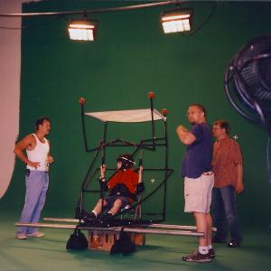 John Rebello, green screen, in flying machine, on set of Twelve, the June segment, Garth Donovan and crew.