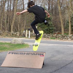 John Rebello, sk8board jump, black tee shirt