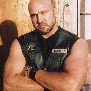 BRYAN HANNA as 'Nasty' on the set of '1%'. TV movie about the 'Hells Angels'.