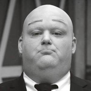 playing ALFRED HITCHCOCK