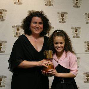 Deborah Carlson, best animated effects, with presenter Madison Pettis.