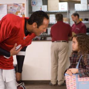 Still of Dwayne Johnson and Madison Pettis in The Game Plan (2007)