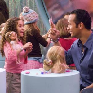 Still of Dwayne Johnson and Madison Pettis in The Game Plan 2007