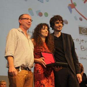 Guilliaume De Seille Nana Ekvtimishvili and Simon Gross at the Sarajevo Film Festival receiving The Heart of the Sarajevo for Best Film IN BLOOM