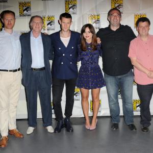 Actor Mark Gatiss actor David Bradley actor Matt Smith actress Jenna Coleman producer Marcus Wilson and writer Steven Moffat speak onstage at BBC Americas Doctor Who 50th Anniversary panel during ComicCon International 2013 at San Diego Convention Center on July 21 2013 in San Diego California