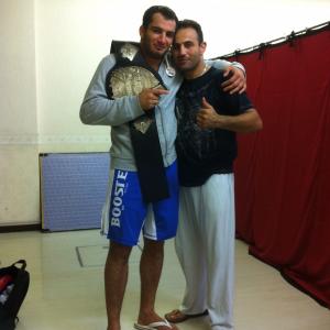 Roman Mitichyan with MMA fighter Gregard Mousassi in Japan.