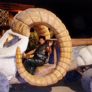 Seth driving the prehistoric 4wheel drive Dodge Ram pickup truck as his Bronto King Patron character one starry night at the gravel quarry set location of feature film The Flintstones in Viva Rock Vegas 2000