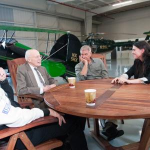 SANTA MONICA CA  NOV 22 2011 Sean D Tucker Bob Hoover Harrison Ford and Director Kim Furst during principal photography of Flying the Feathered Edge The Bob Hoover Project