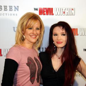 Producerdirector Jenine Mayring ZOMBIE BOYFRIEND music video and singer Emii on the red carpet at Unseen Productions premiere of THE DEVIL WITHIN