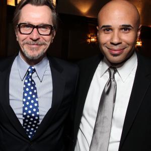 Actor Gary Oldman and ManagerProducer Chris Roe Malcolm McDowell Honored With A Star On The Hollywood Walk Of Fame on March 16 2012 in Hollywood California