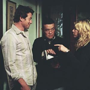 Director HIDEO NAKATA (center) discusses an upcoming scene with stars SIMON BAKER and NAOMI WATTS on the set of DreamWorks Pictures' horror thriller THE RING TWO.