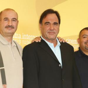Oliver Stone William Jimeno and John McLoughlin at event of World Trade Center 2006