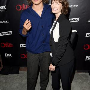 Gale Anne Hurd and Frank Dillane at event of Outcast 2016