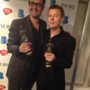 Chris Gutch L Martin Phipps R accepting Ivor Novello Awards for the music to The Shadow Line BBC