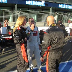 Mieke Buchan AFL star Gary Ablett Jr and driver Cam McConvil debrief after their F1 Hot Laps Australian F1 Grand Prix 2010