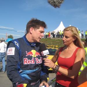 Field reporter, Mieke Buchan, interviews pilot Kirby Chambliss, at the conclusion of finals racing. Red Bull Air Race World Series. 2008. Porto, Portugal