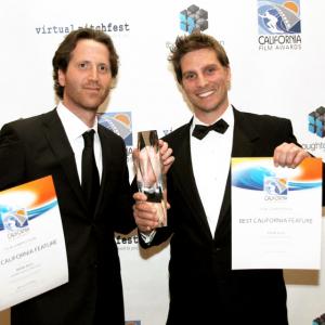 Johnny Scalco L and Doug Maguire R hold their trophy and award certificates at the 2012 California Film Awards where their independent movie Bank Roll won Best California Feature