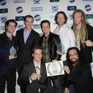 TOP (L-R): Scott Bailey, Anthony Hansen, Josh Roman, Johnny Scalco and Azmyth Kaminski, BOTTOM (L-R): Doug Maguire and Emilio Rossal pose on the red carpet at the 2012 Hollywood Reel Independent Film Festival where their movie Bank Roll won three awards.