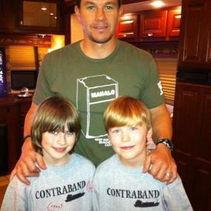 Connor Hill and Mark Wahlberg and Bryce McDaniels on the set of Contraband