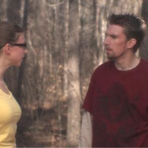 Still of Erik A. Williams and Stephanie Lomenick in The Man in the Maze (2011)