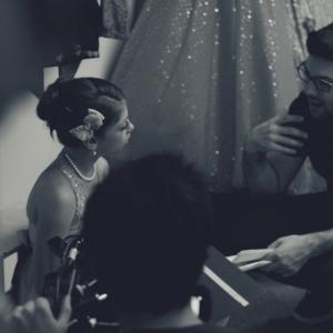 Director Mark Ratzlaff and actress Taya Clyne go over a scene on the set of Beauty Mark