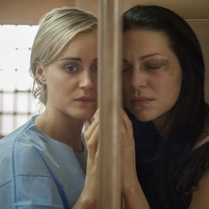 Still of Laura Prepon and Taylor Schilling in Orange Is the New Black 2013