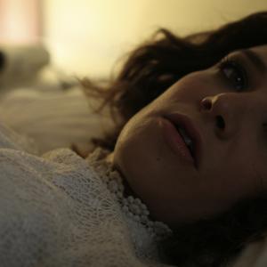 Still of Jessica Chapnik Kahn from the music video to the Australian film The Square