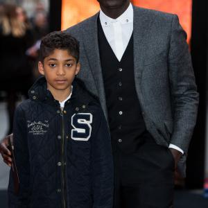Ozwald Boateng and his son Oscar Boateng attends the European premiere of Godzilla at the Odeon Leicester Square on May 11 2014 in London England