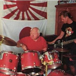 Mickey Rooney on drums with son Mark Rooney on guitar in 1990.