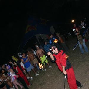 Producer Robin Blesch filming firedancers at Halloween on Haunted Hill in San Antonio before WPFG Studios artist YaBoi Lavish performed for almost 1000 party guests