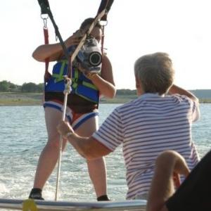 Producer Robin Blesch filming while parasailing