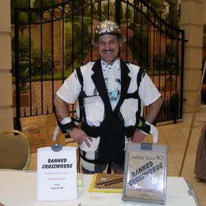 Jim Jenista at the 2006 American Crossword Puzzle Tournament, with his book, 