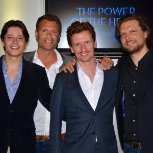 Mattijs van Moorsel producer Arnoud Fioole producer Drew Heriot writerdirector and Baptist de Pape producerauthor at the cast and crew screening of The Power the Heart in Amsterdam