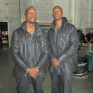 Still of Tyrese Gibson (left) Julius Denem (right) on set of Furious 7.