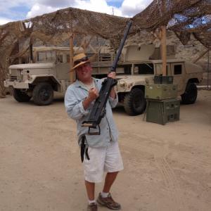 Military Tech consultant Lance Miccio rigging 50 cal on Humvee