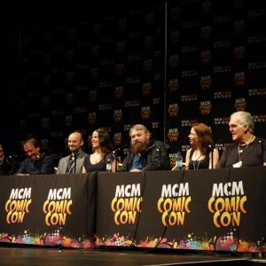 The cast and crew of of Welcome To Purgatory on stage at Comic Con 2014