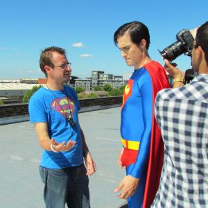 Director Gene Fallaize directs Martin Richardson on the set of Superman: Requiem