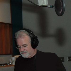 VO Joe in the studio preparing for a read