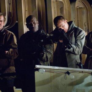 Still of Dennis Quaid Charles S Dutton Paul Bettany and Tyrese Gibson in Legionas 2010