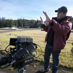 Director Scott A. Capestany framing a shot at a Western WA Airstrip for his TV Series THE RAINFOREST.