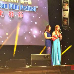 Kimberley Kates and Lucy Yang present Best Producer and Screenwriter of TV series for Chinese American Film Festival